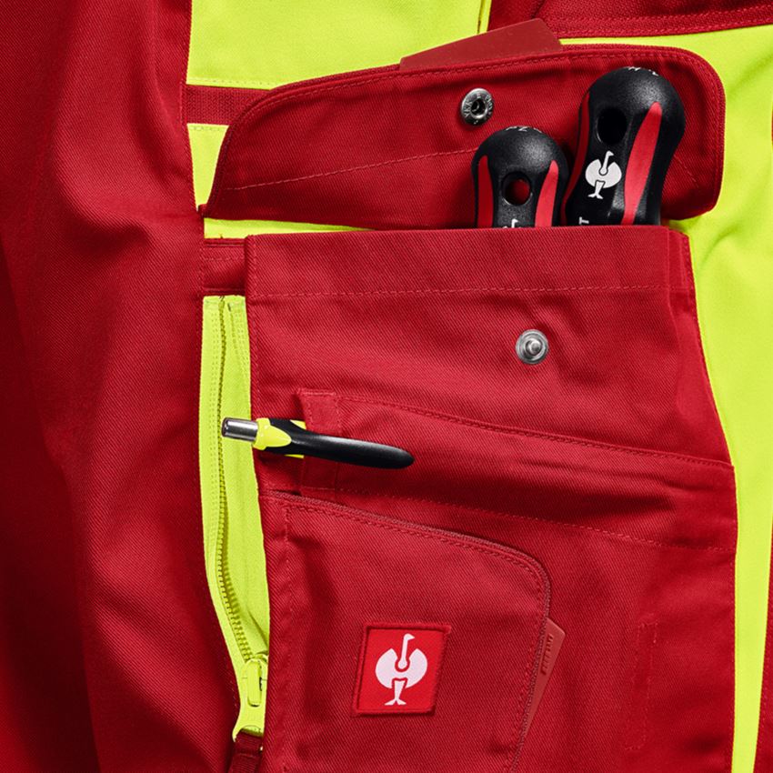 Kleding: Veiligheidswerkbroek e.s.motion 24/7 + rood/signaalgeel 2