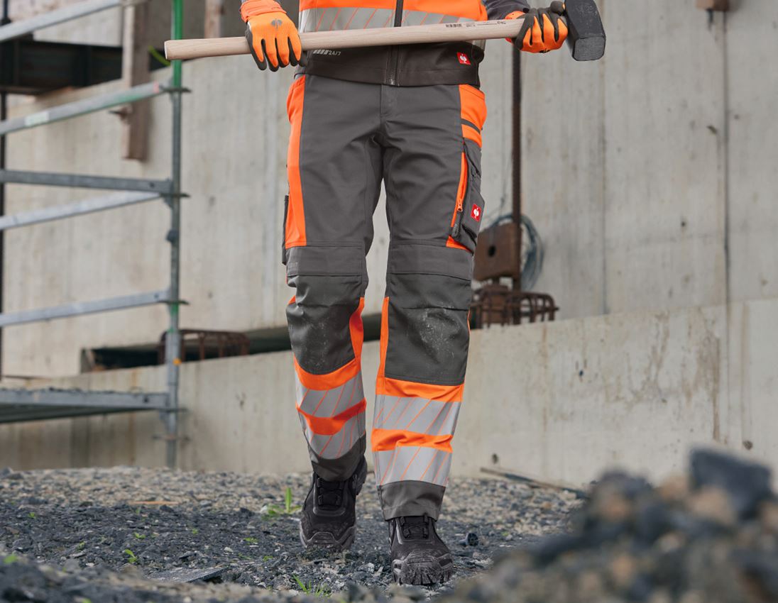 Kleding: Veiligheidswerkbroek e.s.motion 24/7 + antraciet/signaaloranje